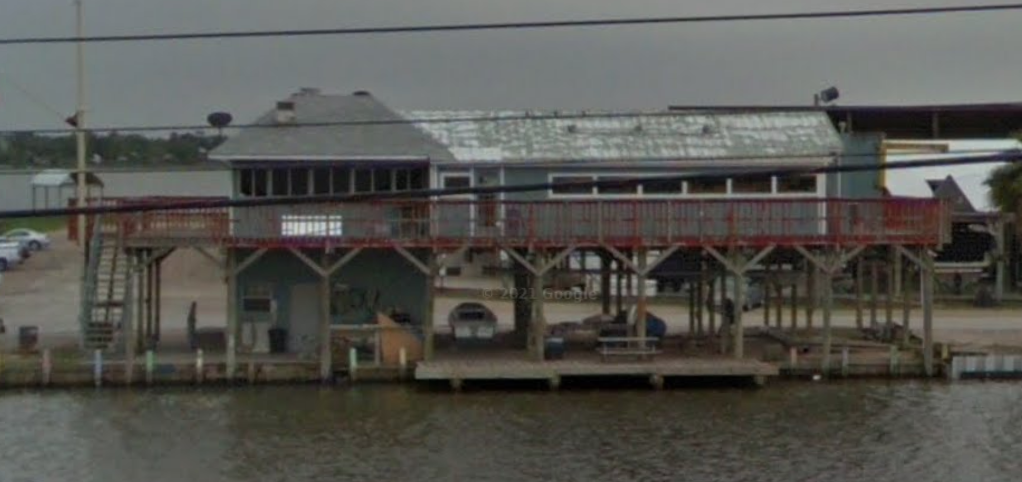 Original waterfront bait shop building before renovation in April 2011